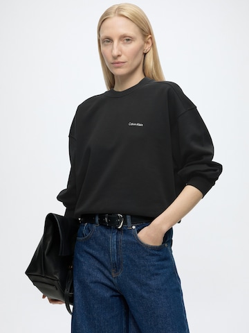 Calvin KleinSweater majica - crna boja