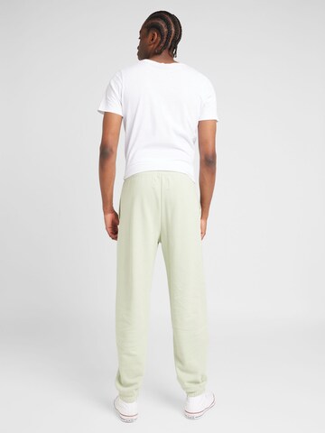 Champion Authentic Athletic Apparel Tapered Trousers in Green