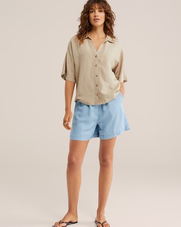 mėlyna WE Fashion Plačios klešnės Džinsai