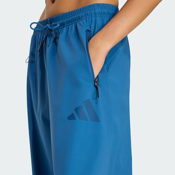 ADIDAS SPORTSWEAR - Pierna ancha Pantalón deportivo 'Z.N.E.' en azul