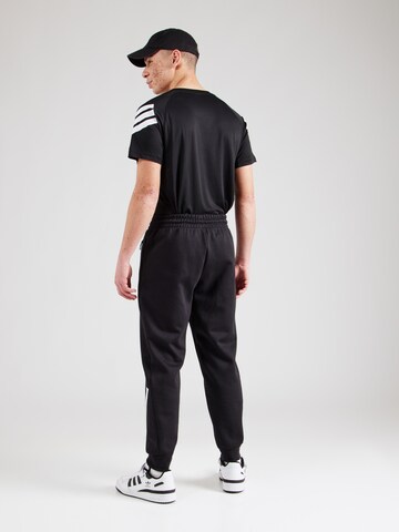 Effilé Pantalon de sport 'Z.N.E.' ADIDAS SPORTSWEAR en noir