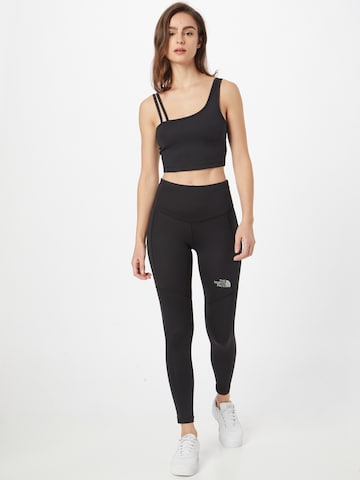 THE NORTH FACE - Skinny Calças de desporto em preto