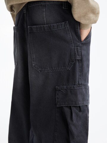 Loosefit Jeans cargo di Pull&Bear in nero