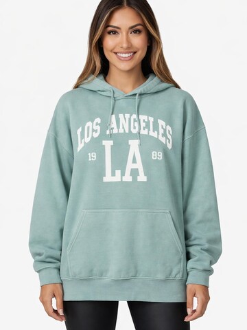 Worldclassca Oversized Sweater in Green: front