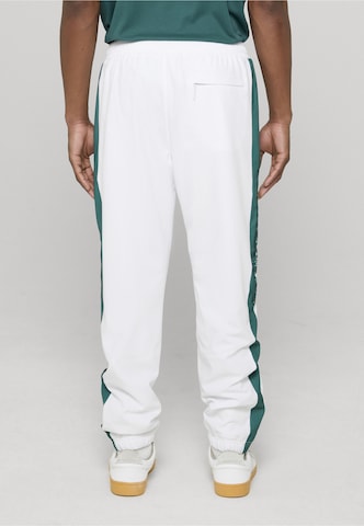 Effilé Pantalon de sport Sergio Tacchini en blanc