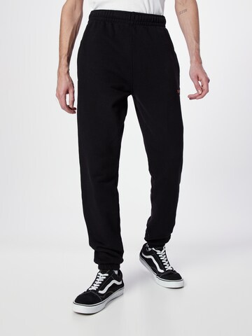 Superdry Tapered Pants in Black: front