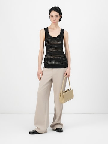 TOMMY HILFIGER - Top de punto en negro