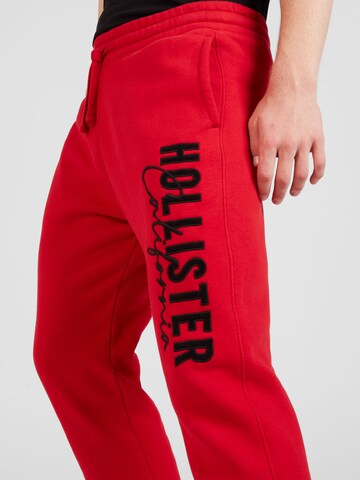 HOLLISTER Tapered Trousers in Red