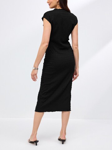 Robe Next en noir
