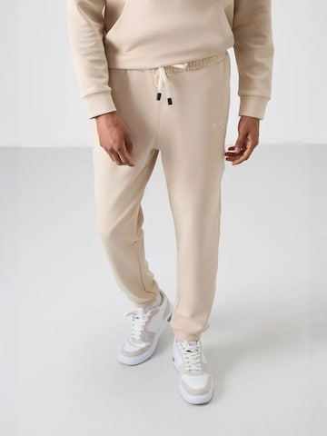 Survêtement Tommy Life en beige