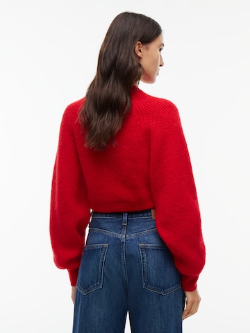 Pulover de la Tommy Jeans pe roșu