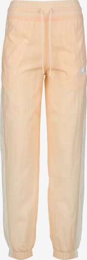 new balance Pantalon de sport en abricot / blanc, Vue avec produit