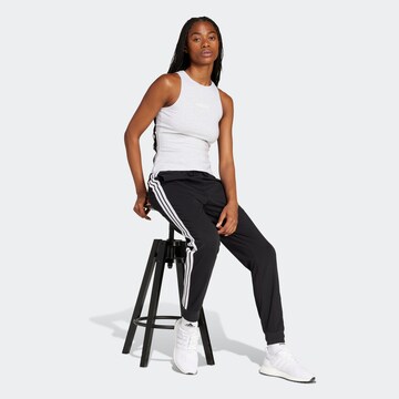 Tapered Pantaloni sport de la ADIDAS SPORTSWEAR pe negru
