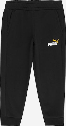 PUMA - Calças em preto: frente