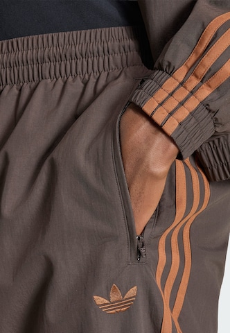 Effilé Pantalon 'Firebird' ADIDAS ORIGINALS en marron
