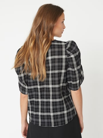 Chemisier 'Sally' co'couture en noir
