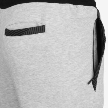 PUMA Tapered Workout Pants 'TeamFINAL 21' in Grey