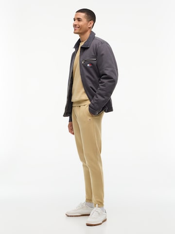 Effilé Pantalon Tommy Jeans en beige