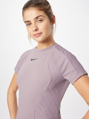 NIKE Funktionsbluse i lilla