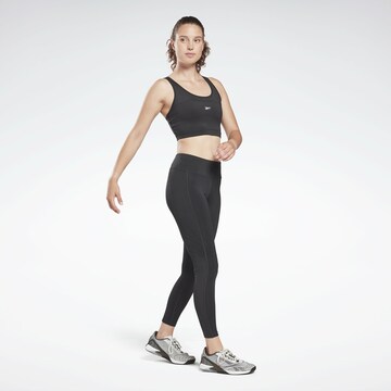 Skinny Pantaloni sportivi di Reebok in nero