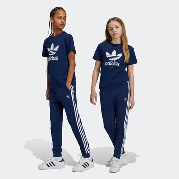 ADIDAS ORIGINALS Дънки Tapered Leg Панталон 'Trefoil' в синьо