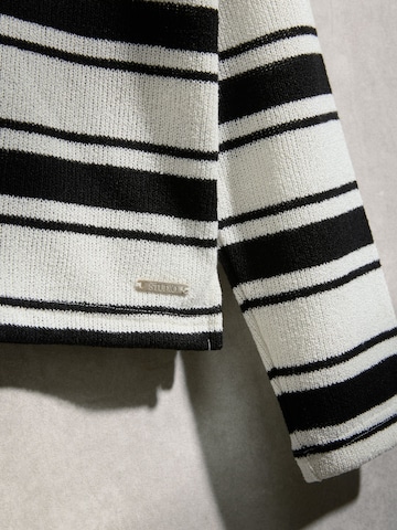 Next Huispak in Zwart