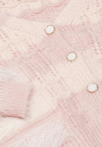 Cardigan swirly en rose