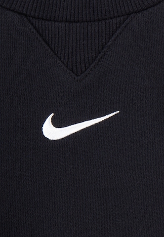 Nike Sportswear Trenirka za tek 'ESSENTIAL' | črna barva