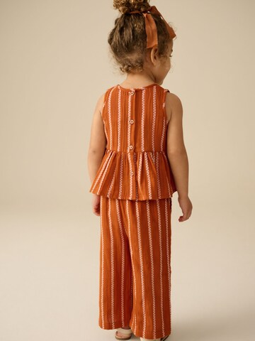 Set Next en orange