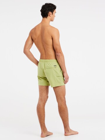 PROTEST Badeshorts 'PRTYESSINE' in Grün