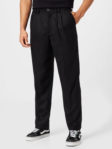 Wax London Regular Pleat-front trousers in Black: front