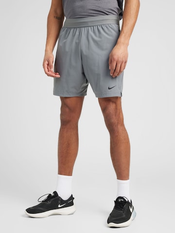 NIKE Regular Спортен панталон 'FLEX REP 4.0' в сиво: отпред