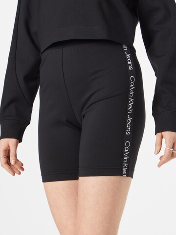 Calvin Klein Jeans Skinny Leggings 'Milao' - fekete