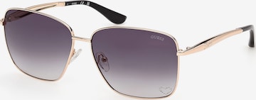 Lunettes de soleil GUESS en or : devant