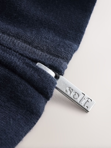 Veste de survêtement self. en bleu
