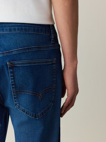 Next Slimfit Jeans 'Motionflex' i blå
