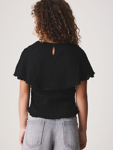 Next - Camiseta en negro