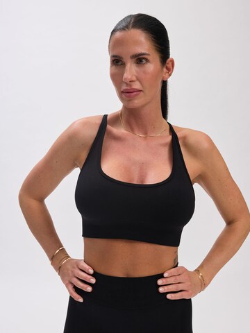 V!BE STUD!OS Sporttop 'Dena' in Schwarz