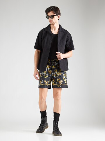 regular Pantaloni di Versace Jeans Couture in nero