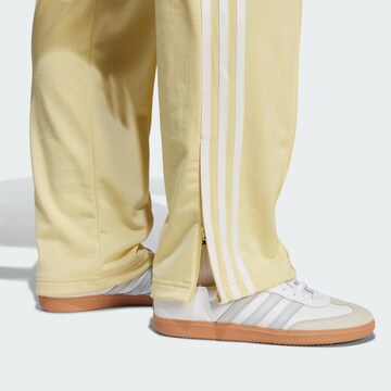 ADIDAS ORIGINALS Regular Hose 'Adicolor Classics Firebird' in Gelb