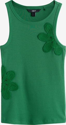 Haut Next en vert : devant