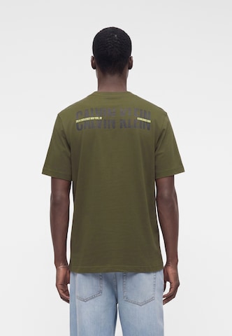 Tricou 'EASY' de la Calvin Klein Jeans pe verde: față