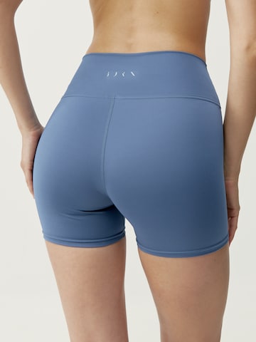 Born Living Yoga Skinny Workout Pants 'Volea' in Blue