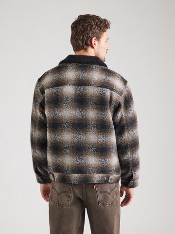 LEVI'S ® Přechodná bunda 'Relaxed Fit Plaid Sherpa Trucker Jacket' – hnědá
