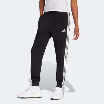 ADIDAS SPORTSWEAR Tapered Sports trousers in Black: front