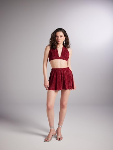 HOLLY LOLLY Loose fit Trousers in Red: front