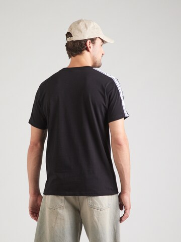 Tricou 'GRECO' de la Sergio Tacchini pe negru: spate