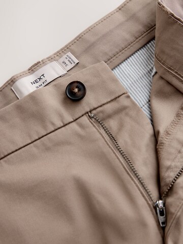 Coupe slim Pantalon chino Next en marron