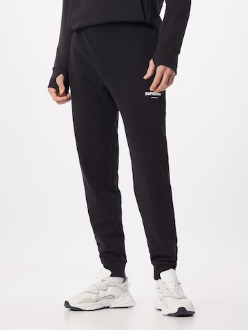 Superdry Tapered Pants in Black: front