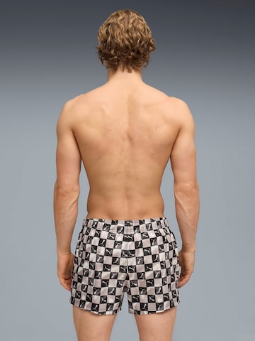 regular Pantaloni sportivi 'Puma Swim Men Printed Cat Short Shorts' di PUMA in nero